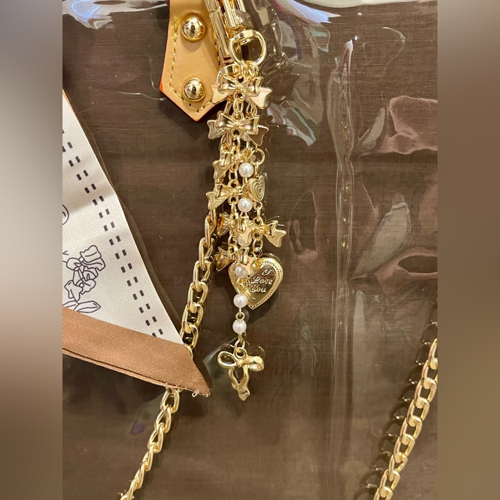 Louis Vuitton Elegant Brown Shopping Tote Bag with Scarf Accent and charms - Picture 5 of 11